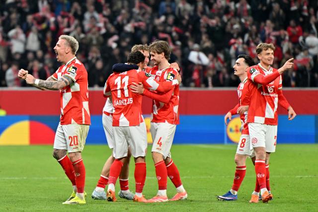 19 March 2026, Rheinland-Pfalz, Mainz: Mainz's Armindo Sieb (2nd L) celebrates scoring his side's second goal with teammates during the UEFA Europa Conference League round of 16 second leg soccer match between FSV Mainz 05 and Sigma Olomouc at Mewa Arena. Photo: Torsten Silz/dpa
