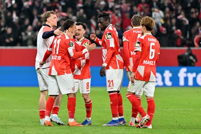 19 March 2026, Rheinland-Pfalz, Mainz: Mainz's Armindo Sieb (2nd L) celebrates scoring his side's second goal with teammates during the UEFA Europa Conference League round of 16 second leg soccer match between FSV Mainz 05 and Sigma Olomouc at Mewa Arena. Photo: Torsten Silz/dpa