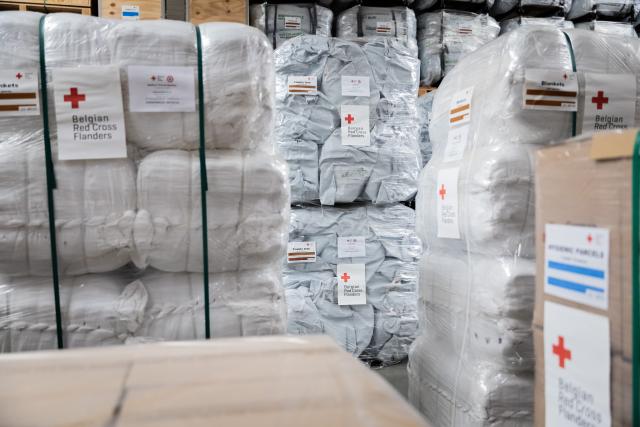 20 March 2026, Brandenburg, Schönefeld: Relief supplies for Lebanon are about to be loaded at the DRK logistics center at Berlin-Schoenefeld Airport. Around 30 tons of relief supplies are being loaded. They will first be transported by truck to Maastricht and from there via an EU air bridge to Beirut. Photo: Christoph Soeder/dpa