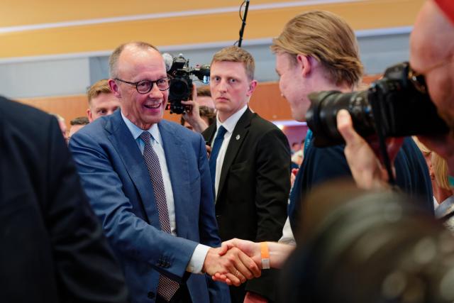 20 March 2026, Rhineland-Palatinate, Bad Duerkheim: German Chancellor Friedrich Merz arrives at the Salierhalle to mark the conclusion of the Christian Democratic Union (CDU) state election campaign. Photo: Uwe Anspach/dpa