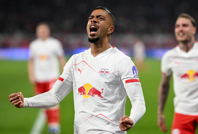 20 March 2026, Saxony, Leipzig: Leipzig's Benjamin Henrichs celebrates scoring his side's fifth goal during the German Bundesliga soccer match between RB Leipzig and TSG 1899 Hoffenheim at Red Bull Arena. Photo: Julius Frick/dpa