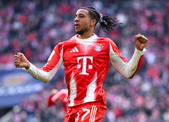 21 March 2026, Bavaria, Munich: Bayern Munich's Michael Olise celebrates scoring his side's first goal during the German Bundesliga soccer match between Bayern Munich and 1. FC Union Berlin at the Allianz Arena. Photo: Sven Hoppe/dpa - WICHTIGER HINWEIS: Gemäß den Vorgaben der DFL Deutsche Fußball Liga bzw. des DFB Deutscher Fußball-Bund ist es untersagt, in dem Stadion und/oder vom Spiel angefertigte Fotoaufnahmen in Form von Sequenzbildern und/oder videoähnlichen Fotostrecken zu verwerten bzw. verwerten zu lassen.