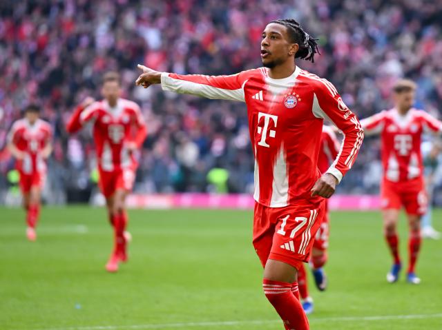 21 March 2026, Bavaria, Munich: Bayern Munich's Michael Olise celebrates scoring his side's first goal during the German Bundesliga soccer match between Bayern Munich and 1. FC Union Berlin at the Allianz Arena. Photo: Sven Hoppe/dpa - WICHTIGER HINWEIS: Gemäß den Vorgaben der DFL Deutsche Fußball Liga bzw. des DFB Deutscher Fußball-Bund ist es untersagt, in dem Stadion und/oder vom Spiel angefertigte Fotoaufnahmen in Form von Sequenzbildern und/oder videoähnlichen Fotostrecken zu verwerten bzw. verwerten zu lassen.