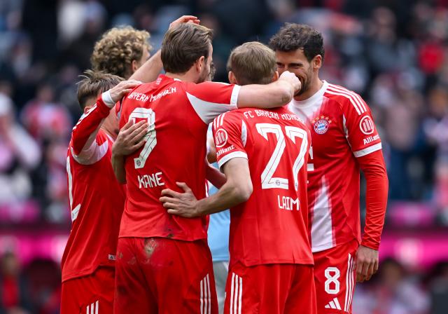21 March 2026, Bavaria, Munich: Bayern Munich's Harry Kane (3rd R) celebrates scoring his side's third goal with teammates during the German Bundesliga soccer match between Bayern Munich and 1. FC Union Berlin at the Allianz Arena. Photo: Sven Hoppe/dpa - WICHTIGER HINWEIS: Gemäß den Vorgaben der DFL Deutsche Fußball Liga bzw. des DFB Deutscher Fußball-Bund ist es untersagt, in dem Stadion und/oder vom Spiel angefertigte Fotoaufnahmen in Form von Sequenzbildern und/oder videoähnlichen Fotostrecken zu verwerten bzw. verwerten zu lassen.