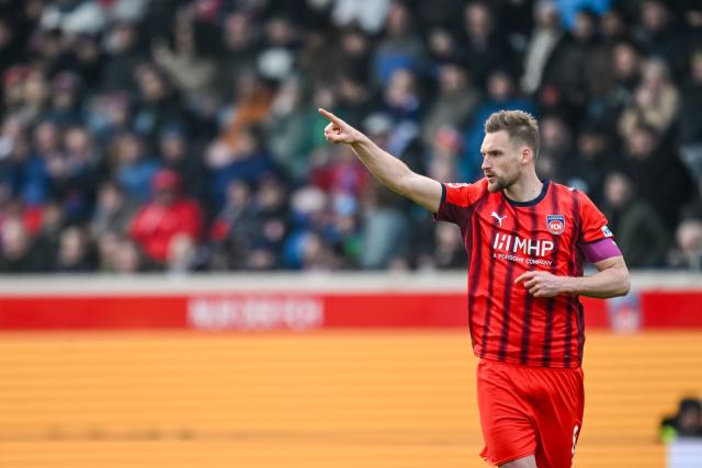 21 March 2026, Baden-Wuerttemberg, Heidenheim: Heidenheim's Patrick Mainka celebrates his sides first goal during the German Bundesliga soccer match between 1. FC Heidenheim and Bayer Leverkusen at Voith-Arena. Photo: Harry Langer/dpa - WICHTIGER HINWEIS: Gemäß den Vorgaben der DFL Deutsche Fußball Liga bzw. des DFB Deutscher Fußball-Bund ist es untersagt, in dem Stadion und/oder vom Spiel angefertigte Fotoaufnahmen in Form von Sequenzbildern und/oder videoähnlichen Fotostrecken zu verwerten bzw. verwerten zu lassen.