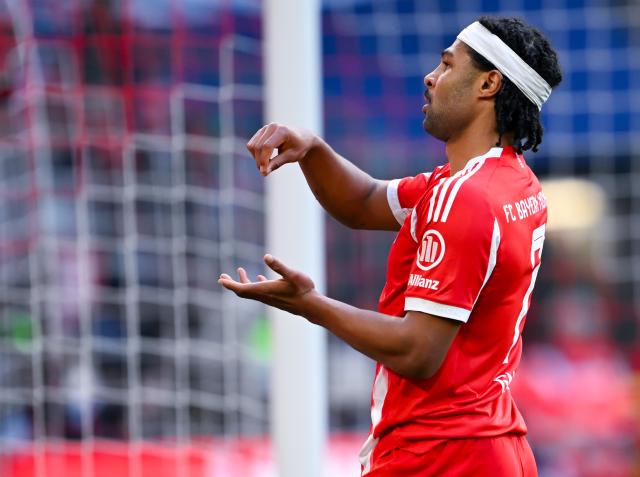 21 March 2026, Bavaria, Munich: Bayern Munich's Serge Gnabry celebrates scoring his side's fourth goal during the German Bundesliga soccer match between Bayern Munich and 1. FC Union Berlin at the Allianz Arena. Photo: Sven Hoppe/dpa - WICHTIGER HINWEIS: Gemäß den Vorgaben der DFL Deutsche Fußball Liga bzw. des DFB Deutscher Fußball-Bund ist es untersagt, in dem Stadion und/oder vom Spiel angefertigte Fotoaufnahmen in Form von Sequenzbildern und/oder videoähnlichen Fotostrecken zu verwerten bzw. verwerten zu lassen.