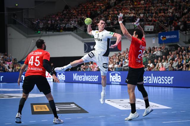 22 March 2026, Bremen: Germany's Miro Schluroff (C) in action during the Men's International Handball match between Germany and Egypt. Photo: Sina Schuldt/dpa
