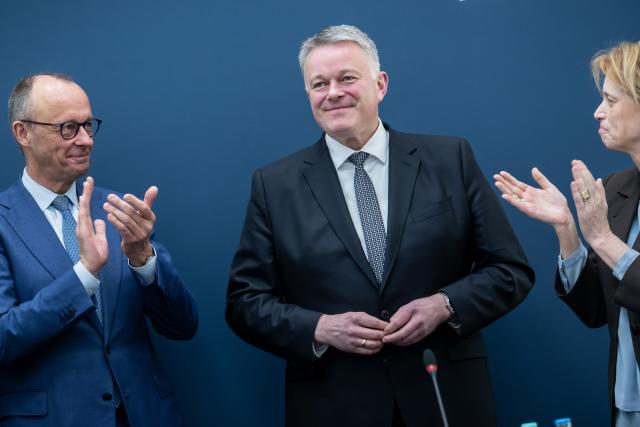 23 March 2026, Berlin: Gordon Schnieder, top candidate of the Christian Democratic Union (CDU) stands between German Chancellor Friedrich Merz and Karin Prien, Germanl Minister for Education, Family Affairs, Senior Citizens, Women and Youth, before the meeting of the CDU Federal Executive Committee at the Konrad Adenauer House. Photo: Michael Kappeler/dpa