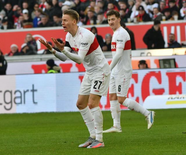 FILED - 27 January 2024, Baden-Württemberg, Stuttgart: Stuttgart's Chris Fuehrich (L) gestures next to his teammate Angelo Stiller during the German Bundesliga soccer match between VfB Stuttgart and RB Leipzig at MHPArena. VfB Stuttgart midfielders Angelo Stiller and Chris Führich received late call-ups to the Germany squad on Monday after Felix Nmecha and Aleksandar Pavlovic were forced to withdraw. Photo: Jan-Philipp Strobel/dpa