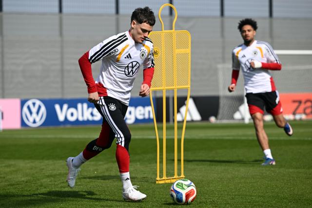 24 March 2026, Bavaria, Herzogenaurach: Germany's Florian Wirtz in action during the team's training session ahead of the FIFA World Cup qualifying soccer match against Switzerland. Photo: Federico Gambarini/dpa