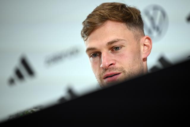 24 March 2026, Bavaria, Herzogenaurach: Germany's Joshua Kimmich speaks during a press conference of the German National team ahead of the international friendly match against Switzerland. Photo: Federico Gambarini/dpa - IMPORTANT NOTICE: DFL and DFB regulations prohibit any use of photographs as image sequences and/or quasi-video.