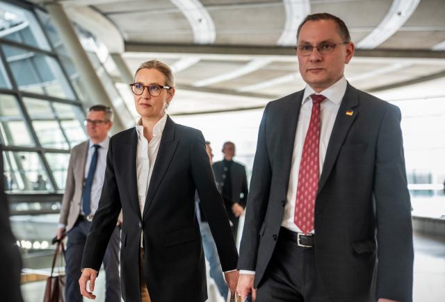 24 March 2026, Berlin: Alice Weidel and Tino Chrupalla, leaders of the Alternative for Germany (AfD) party, arrive to give a press statement before the parliamentary group meeting in the German Parliament (Bundestag). Photo: Michael Kappeler/dpa