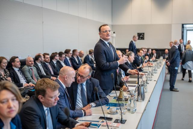 24 March 2026, Berlin: to Jens Spahn, CDU/CSU parliamentary group leader in the Bundestag, speaks next to German Chancellor Friedrich Merz at the start of the parliamentary group meeting of the Christian Democratic Union in the German Parliament (Bundestag). Photo: Michael Kappeler/dpa