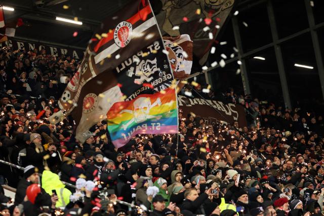 FILED - 23 January 2026, Hamburg: St. Pauli fans cheer on their team before kickoff during the German Bundesliga soccer match between FC St. Pauli and Hamburger SV at Millerntor Stadium. Photo: Christian Charisius/dpa