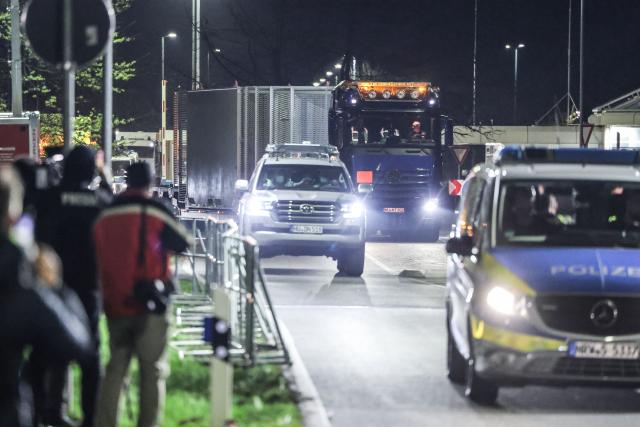 24 March 2026, North Rhine-Westphalia, Jülich: A truck carrying a Castor container leaves the Juelich Research Center as Castor transports are scheduled to travel through North Rhine-Westphalia from Juelich to Ahaus. Photo: Oliver Berg/dpa