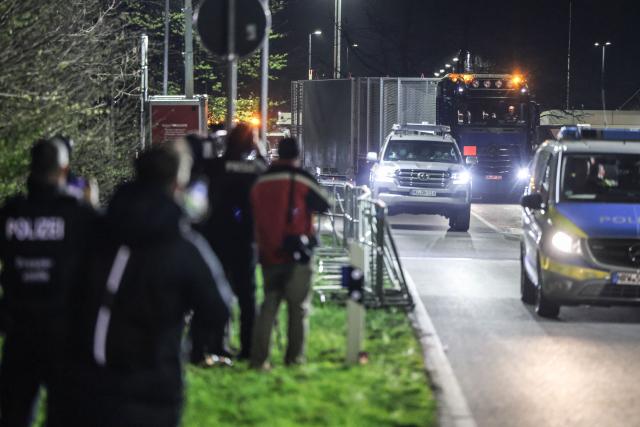 24 March 2026, North Rhine-Westphalia, Jülich: A truck carrying a Castor container leaves the Juelich Research Center as Castor transports are scheduled to travel through North Rhine-Westphalia from Juelich to Ahaus. Photo: Oliver Berg/dpa