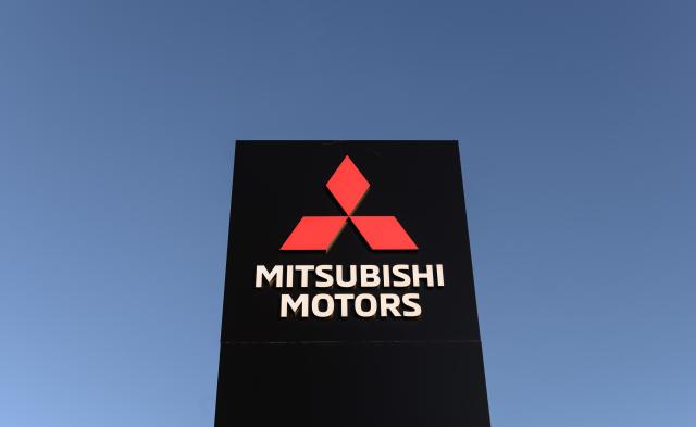 FILED - 21 January 2020, Hesse, Friedberg: The logo of Japanese car manufacturer Mitsubishi Motors is seen displayed at the company's premises in Friedberg. Photo: Silas Stein/dpa