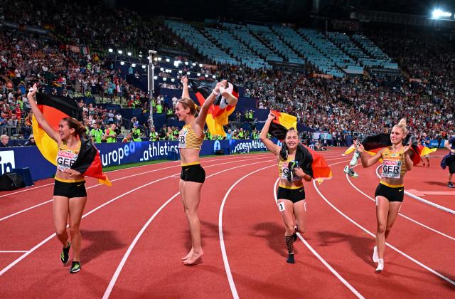FILED - 21 August 2022, Bayern, München: Germany's Lisa Mayer, Gina Lueckenkemper, Alexandra Burghardt and Rebekka Haase celebrate winning the women's 4x100m relay final race at the Olympic Stadium during the 2022 European Championships in Munich.  Munich will big to host the world athletics championships in 2029 or 2031, the council of the German city has agreed upon. Photo: Sven Hoppe/dpa