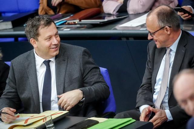 26 March 2026, Berlin: German Chancellor Friedrich Merz (R) and Minister of Finance Lars Klingbeil attend the plenary session of the German Bundestag. Photo: Kay Nietfeld/dpa