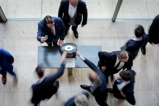 26 March 2026, Berlin: Members of the Bundestag cast their ballots during the roll-call vote on the fuel price package during the plenary session of the German Bundestag. Photo: Kay Nietfeld/dpa