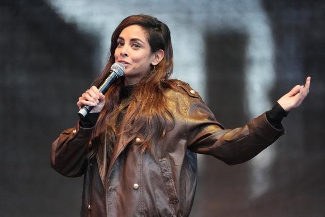 26 March 2026, Hamburg: Collien Fernandes, an actress and TV host, speaks on stage at Rathausmarkt during a demonstration against sexual violence targeting women. Photo: Marcus Brandt/dpa