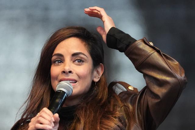 26 March 2026, Hamburg: Collien Fernandes, an actress and TV host, speaks on stage at Rathausmarkt during a demonstration against sexual violence targeting women. Photo: Marcus Brandt/dpa