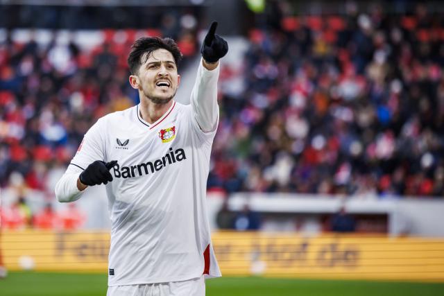FILED - 26 February 2023, Baden-Wuerttemberg, Freiburg im Breisgau: Leverkusen's Sardar Azmoun celebrates scoring his side's first goal during the German Bundesliga soccer match between SC Freiburg and Bayer Leverkusen at Europa-Park Stadium. Photo: Tom Weller/dpa