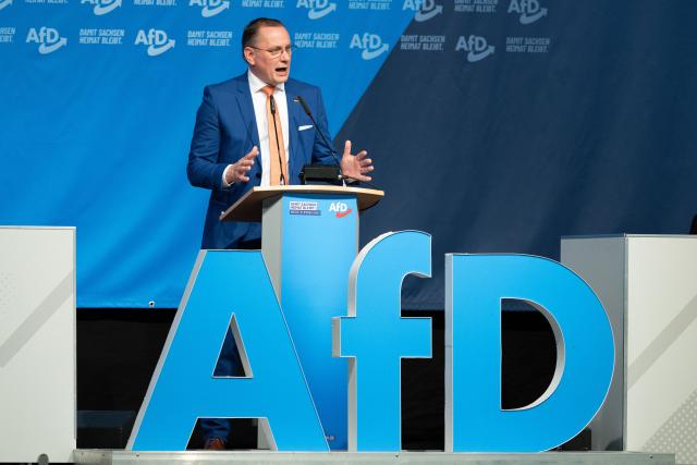 28 March 2026, Saxony, Loebau: Tino Chrupalla, federal chairman of the Alternative for Germany (AfD) and leader of the AfD parliamentary group, speaks at the AfD Saxony state party convention at the Loebau Exhibition and Event Park. Photo: Sebastian Kahnert/dpa