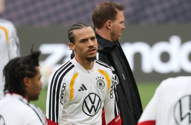 29 March 2026, Stuttgart: Germany national team coach Julian Nagelsmann, Leroy Sane (C) and Serge Gnabry take part in a training session, ahead of Monday's International Friendly soccer match against Ghana. Photo: Christian Charisius/dpa - WICHTIGER HINWEIS: Gemäß den Vorgaben der DFL Deutsche Fußball Liga bzw. des DFB Deutscher Fußball-Bund ist es untersagt, in dem Stadion und/oder vom Spiel angefertigte Fotoaufnahmen in Form von Sequenzbildern und/oder videoähnlichen Fotostrecken zu verwerten bzw. verwerten zu lassen.