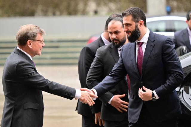 30 March 2026, Berlin: German Foreign Minister Johann Wadephul (L) wlecomes Syria's interim president Ahmed al-Sharaa at the Federal Foreign Office in Berlin. Photo: Sebastian Christoph Gollnow/dpa
