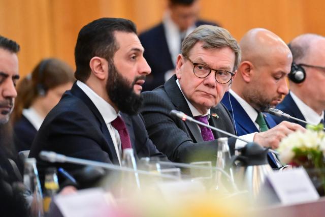 30 March 2026, Berlin: German Foreign Minister Johann Wadephul and Syria's interim president Ahmed al-Sharaa attend a German-Syrian economic roundtable at the Federal Foreign Office in Berlin. Photo: Sebastian Christoph Gollnow/dpa