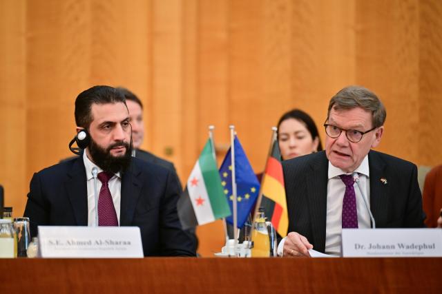 30 March 2026, Berlin: German Foreign Minister Johann Wadephul and Syria's interim president Ahmed al-Sharaa attend a German-Syrian economic roundtable at the Federal Foreign Office in Berlin. Photo: Sebastian Christoph Gollnow/dpa