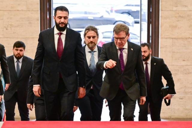 30 March 2026, Berlin: German Foreign Minister Johann Wadephul (R) wlecomes Syria's interim president Ahmed al-Sharaa at the Federal Foreign Office in Berlin. Photo: Sebastian Christoph Gollnow/dpa
