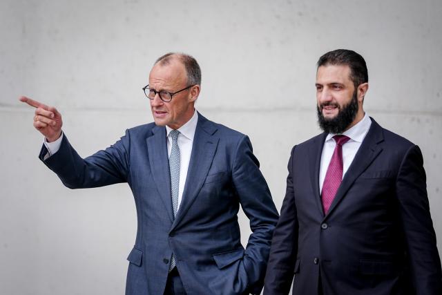 30 March 2026, Berlin: German Chancellor Friedrich Merz (L) receives Syria's interim president Ahmed al-Sharaa at the Federal Chancellery in Berlin. Photo: Kay Nietfeld/dpa