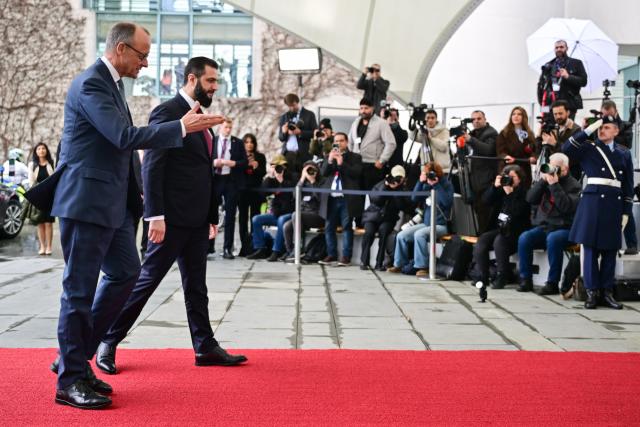 30 March 2026, Berlin: German Chancellor Friedrich Merz (L) receives Syria's interim president Ahmed al-Sharaa at the Federal Chancellery in Berlin. Photo: Sebastian Christoph Gollnow/dpa