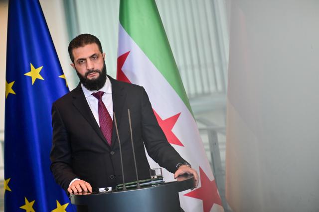 30 March 2026, Berlin: Syria's interim president Ahmed al-Sharaa attends a joint press conference with German Chancellor Friedrich Merz at the Federal Chancellery in Berlin. Photo: Sebastian Christoph Gollnow/dpa