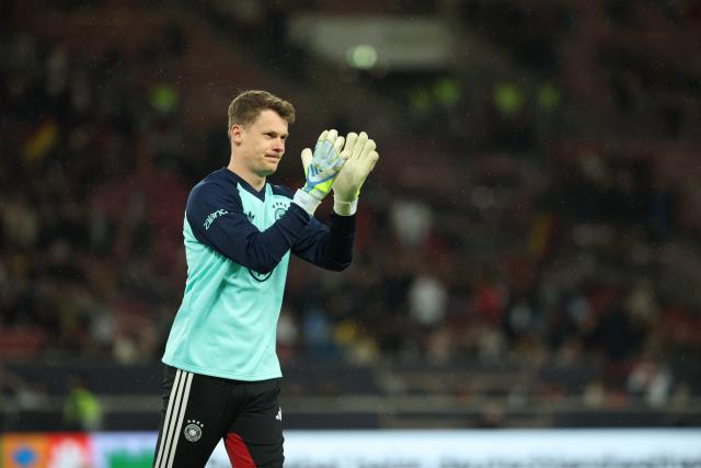 30 March 2026, Baden-Wuerttemberg, Stuttgart: Germany goalkeeper Alexander Nuebel warms up prior to the start of the International Friendly soccer match between Germany and Ghana at MHP Arena. Photo: Christian Charisius/dpa - WICHTIGER HINWEIS: Gemäß den Vorgaben der DFL Deutsche Fußball Liga bzw. des DFB Deutscher Fußball-Bund ist es untersagt, in dem Stadion und/oder vom Spiel angefertigte Fotoaufnahmen in Form von Sequenzbildern und/oder videoähnlichen Fotostrecken zu verwerten bzw. verwerten zu lassen.