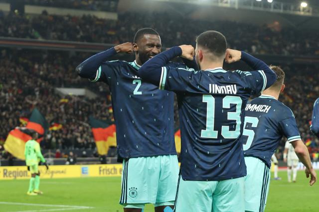 30 March 2026, Baden-Wuerttemberg, Stuttgart: Germany's Deniz Undav celebrates scoring his side's second goal with teammate Antonio Ruediger (L) during the International Friendly soccer match between Germany and Ghana at MHP Arena. Photo: Christian Charisius/dpa - WICHTIGER HINWEIS: Gemäß den Vorgaben der DFL Deutsche Fußball Liga bzw. des DFB Deutscher Fußball-Bund ist es untersagt, in dem Stadion und/oder vom Spiel angefertigte Fotoaufnahmen in Form von Sequenzbildern und/oder videoähnlichen Fotostrecken zu verwerten bzw. verwerten zu lassen.