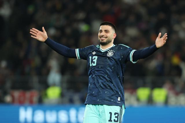 30 March 2026, Baden-Wuerttemberg, Stuttgart: Germany's Deniz Undav celebrates scoring his side's second goal during the International Friendly soccer match between Germany and Ghana at MHP Arena. Photo: Christian Charisius/dpa - WICHTIGER HINWEIS: Gemäß den Vorgaben der DFL Deutsche Fußball Liga bzw. des DFB Deutscher Fußball-Bund ist es untersagt, in dem Stadion und/oder vom Spiel angefertigte Fotoaufnahmen in Form von Sequenzbildern und/oder videoähnlichen Fotostrecken zu verwerten bzw. verwerten zu lassen.