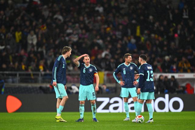 30 March 2026, Baden-Wuerttemberg, Stuttgart: (L-R) Germany's Nick Woltemade, Joshua Kimmich, Leon Goretzka and Deniz Undav look dejected during the International Friendly soccer match between Germany and Ghana at MHP Arena. Photo: Tom Weller/dpa - WICHTIGER HINWEIS: Gemäß den Vorgaben der DFL Deutsche Fußball Liga bzw. des DFB Deutscher Fußball-Bund ist es untersagt, in dem Stadion und/oder vom Spiel angefertigte Fotoaufnahmen in Form von Sequenzbildern und/oder videoähnlichen Fotostrecken zu verwerten bzw. verwerten zu lassen.