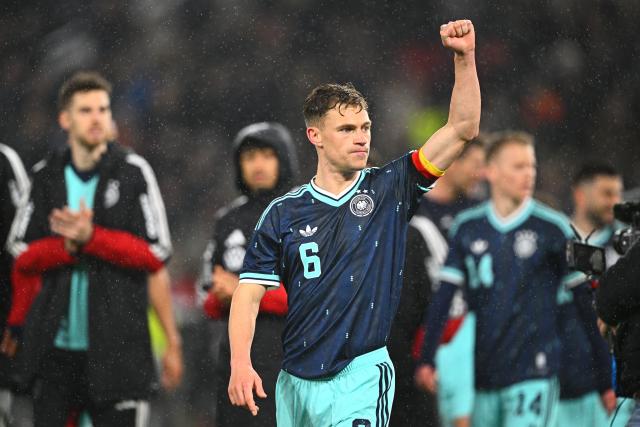 30 March 2026, Baden-Wuerttemberg, Stuttgart: Germany's Joshua Kimmich celebrates after the International Friendly soccer match between Germany and Ghana at MHP Arena. Photo: Tom Weller/dpa - WICHTIGER HINWEIS: Gemäß den Vorgaben der DFL Deutsche Fußball Liga bzw. des DFB Deutscher Fußball-Bund ist es untersagt, in dem Stadion und/oder vom Spiel angefertigte Fotoaufnahmen in Form von Sequenzbildern und/oder videoähnlichen Fotostrecken zu verwerten bzw. verwerten zu lassen.