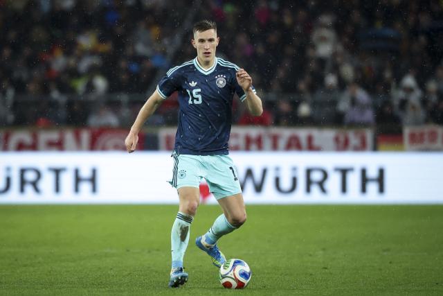 30 March 2026, Baden-Wuerttemberg, Stuttgart: Germany's Nico Schlotterbeck in action during an International Friendly soccer match between Germany and Ghana at MHP Arena. Photo: Christian Charisius/dpa - IMPORTANT NOTICE: DFL and DFB regulations prohibit any use of photographs as image sequences and/or quasi-video.