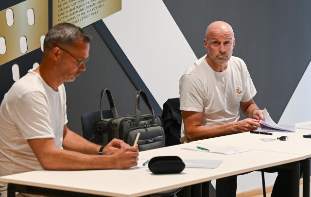 FILED - 28 August 2025, Hesse, Frankfurt/Main: Marco Antwerpen (R) and Frank Doepper, former coaches of third-division club VfL Osnabrueck, take their seats in the courtroom at the start of an oral hearing before the DFB Sports Court at the DFB Campus. Photo: Arne Dedert/dpa