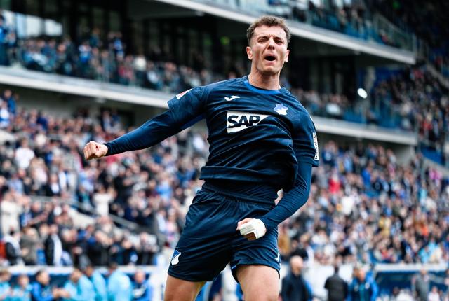 04 April 2026, Baden-Württemberg, Sinsheim: Hoffenheim's Fisnik Asllani celebrates scoring his side's first goal during the German Bundesliga soccer match between TSG 1899 Hoffenheim and FSV Mainz 05 at the PreZero Arena. Photo: Uwe Anspach/dpa - IMPORTANT NOTICE: DFL and DFB regulations prohibit any use of photographs as image sequences and/or quasi-video.