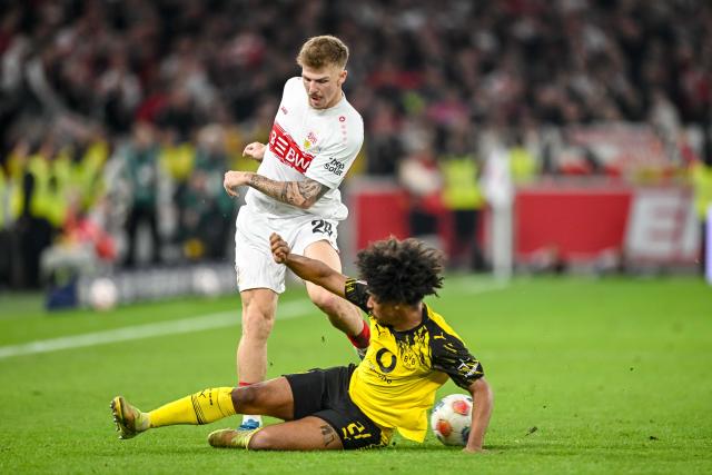 04 April 2026, Baden-Württemberg, Stuttgart: Stuttgart's Finn Jeltsch in action against Dortmund's Karim Adeyemi  during the German Bundesliga soccer match between VfB Stuttgart and Borussia Dortmund at the MHPArena. Photo: Harry Langer/dpa - IMPORTANT NOTICE: DFL and DFB regulations prohibit any use of photographs as image sequences and/or quasi-video.