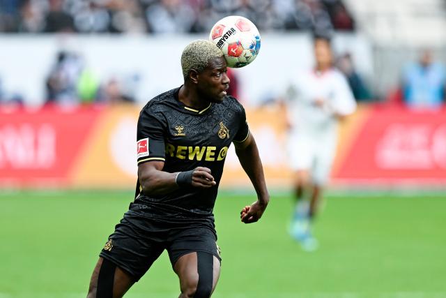 05 April 2026, Hesse, Frankfurt_Main: Cologne's Ragnar Ache plays the ball during the German Bundesliga soccer match between Eintracht Frankfurt and 1. FC Cologne at Deutsche Bank Park Photo: Uwe Anspach/dpa - WICHTIGER HINWEIS: Gemäß den Vorgaben der DFL Deutsche Fußball Liga bzw. des DFB Deutscher Fußball-Bund ist es untersagt, in dem Stadion und/oder vom Spiel angefertigte Fotoaufnahmen in Form von Sequenzbildern und/oder videoähnlichen Fotostrecken zu verwerten bzw. verwerten zu lassen.
