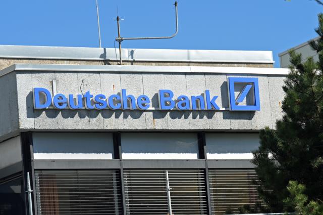 FILED - 08 April 2026, Bavaria, Munich: The Deutsche Bank logo hangs on the facade in Arabellastrasse. Photo: Malin Wunderlich/dpa