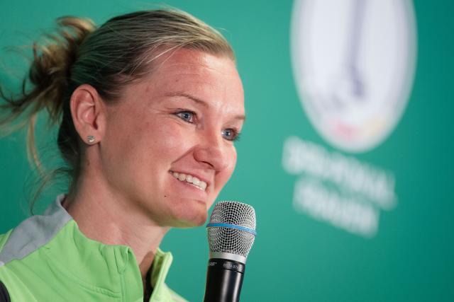 09 April 2026, North Rhine-Westphalia, Cologne: Wolfsburg's Alexandra Popp speaks during a press conference ahead of the German Women's DFB Cup fimal soccer match between FC Bayern Munich and VfL Wolfsburg. Photo: Marius Becker/dpa
