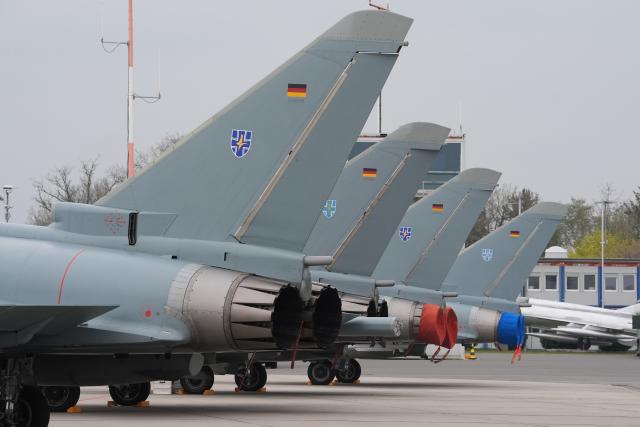 13 April 2026, Schleswig-Holstein, Lübeck: Four out of five Eurofighter fighter jets are based at Lübeck Airport during the "Dispersed Operations 2026" air force exercise. From April 13 to 17, the Tactical Air Force Wing 73 "Steinhoff" will be training take-offs and landings with military fighter aircraft. The aim of the "Dispersed Operations 2026" exercise is to strengthen cooperation with civilian facilities and to practice defense capabilities in a realistic alliance situation. Photo: Marcus Brandt/dpa