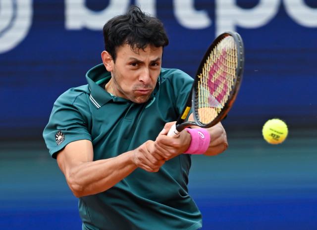 13 April 2026, Bavaria, Munich: US tennis player Emilio Nava in action against his compatriot Ben Shelton during their men's singles round of 32 match of the Bavarian International Tennis Championships. Photo: Sven Hoppe/dpa